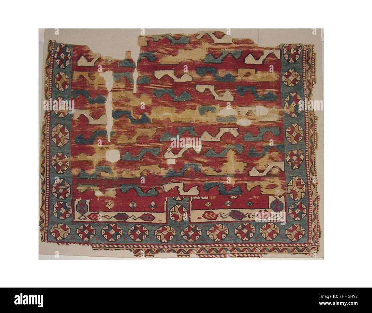 Carpet Fragment 18th century or earlier. Carpet Fragment. 18th century or earlier. Wool pile on wool foundation. Made in Turkey. Textiles-Rugs Stock Photo