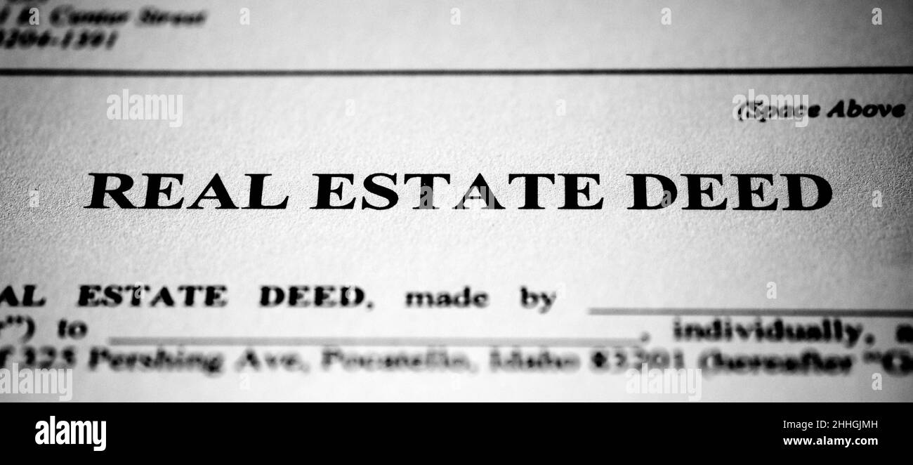 Real estate deed to transfer ownership of land or property Stock Photo