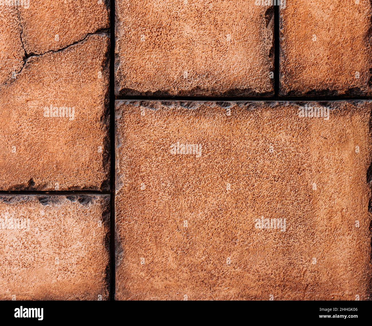 Brown brick paving stone, masonry, brown stone texture background with copy space. Stock Photo