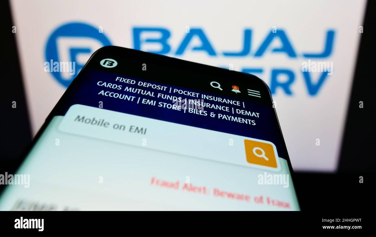 Mobile phone with website of Indian financial company Bajaj Finserv