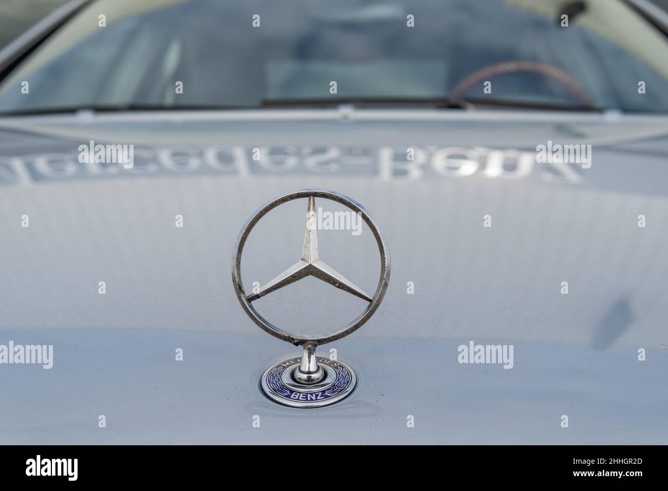 Manacor, Spain; january 20 2022: Close-up of the Mercedes-Benz automobile brand symbol on a silver-colored car Stock Photo