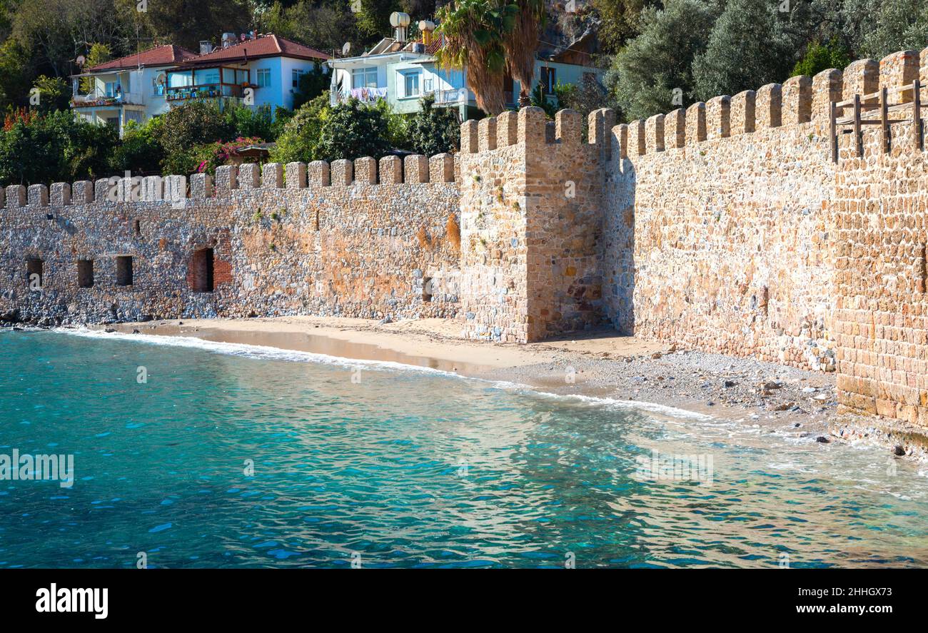 Tersane Beach and wall of fortress, Alanya, Turkey Stock Photo