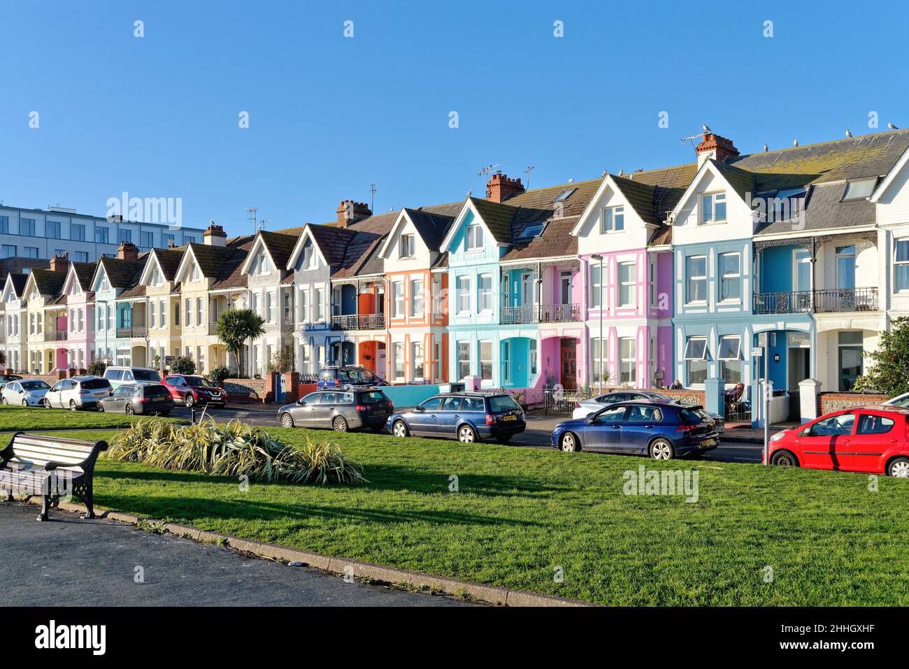Brightly painted terraced houses on New Parade on the seafront at