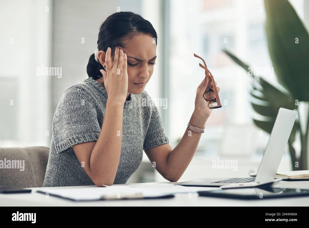 Stress is one of the most common triggers of headaches Stock Photo