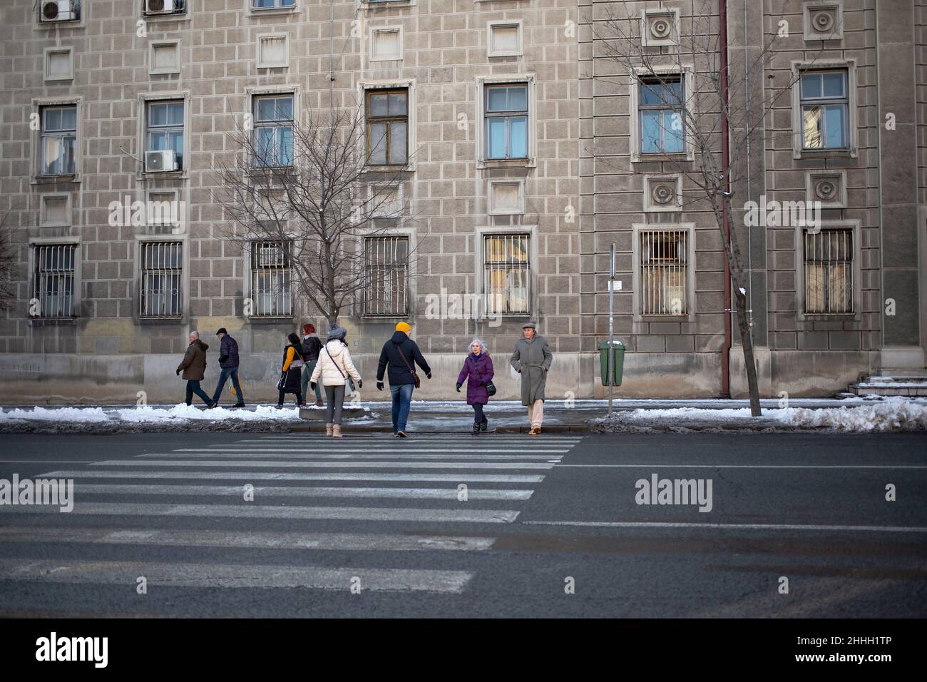 Belgrade, Serbia, Jan 23, 2022: People crossing Glavna Street in Zemun Stock Photo