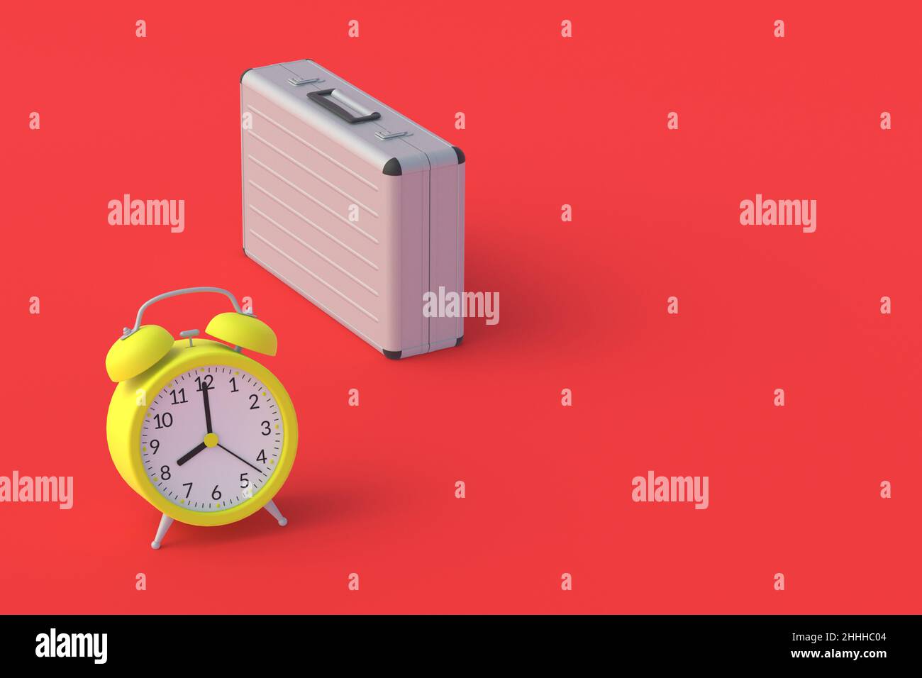 Metal suitcase near vintage alarm clock. Work schedule in the office