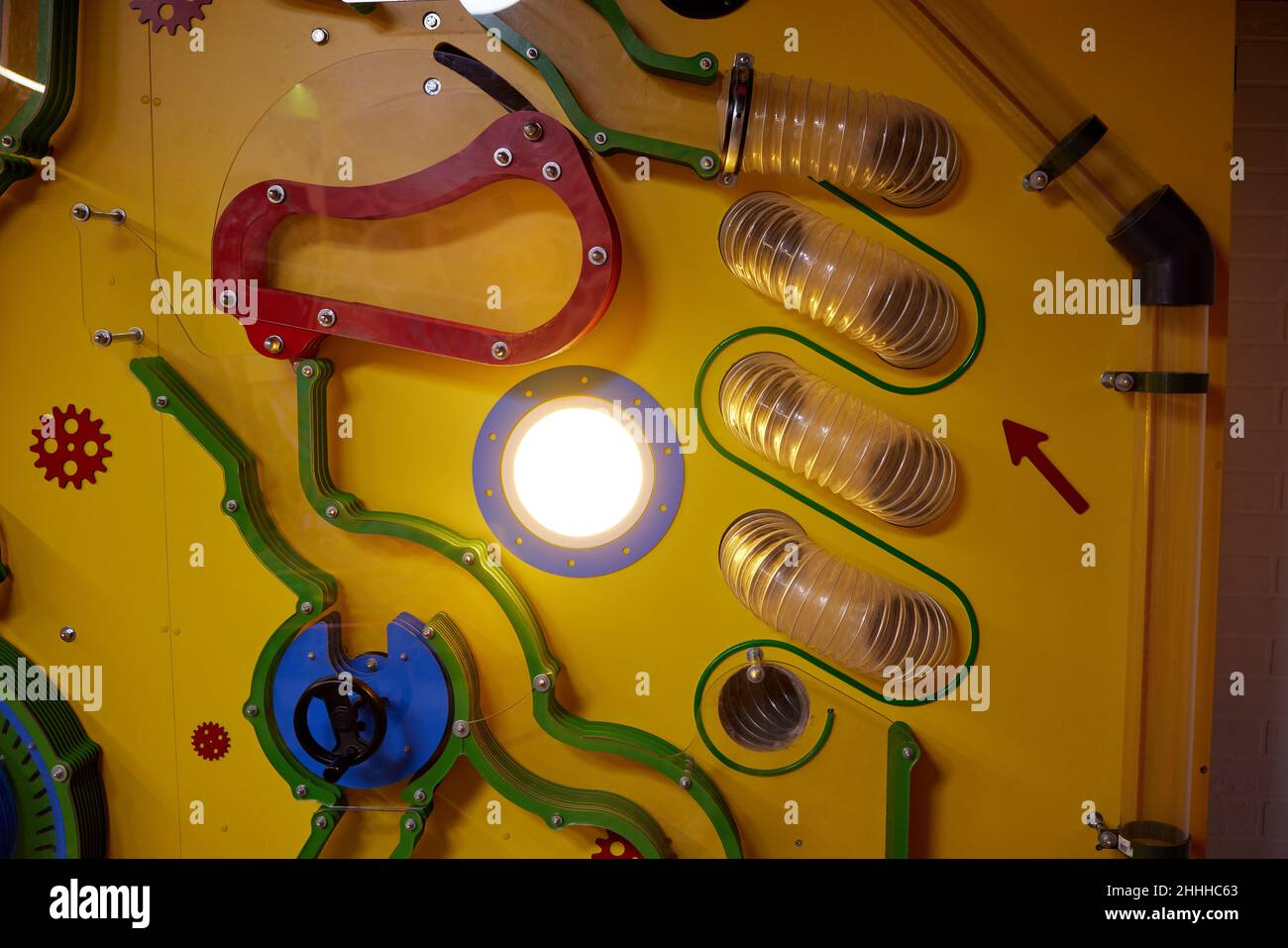 colorful busy board as best toy for kids. wooden board with zipper, Velcro, flashlight, mirror