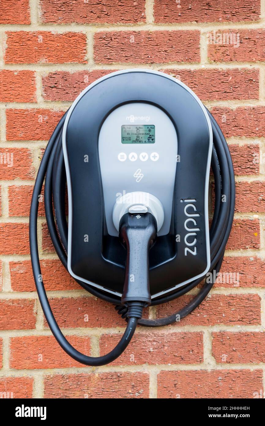 A Zappi electric car charger fixed to outside wall of a private house. Stock Photo