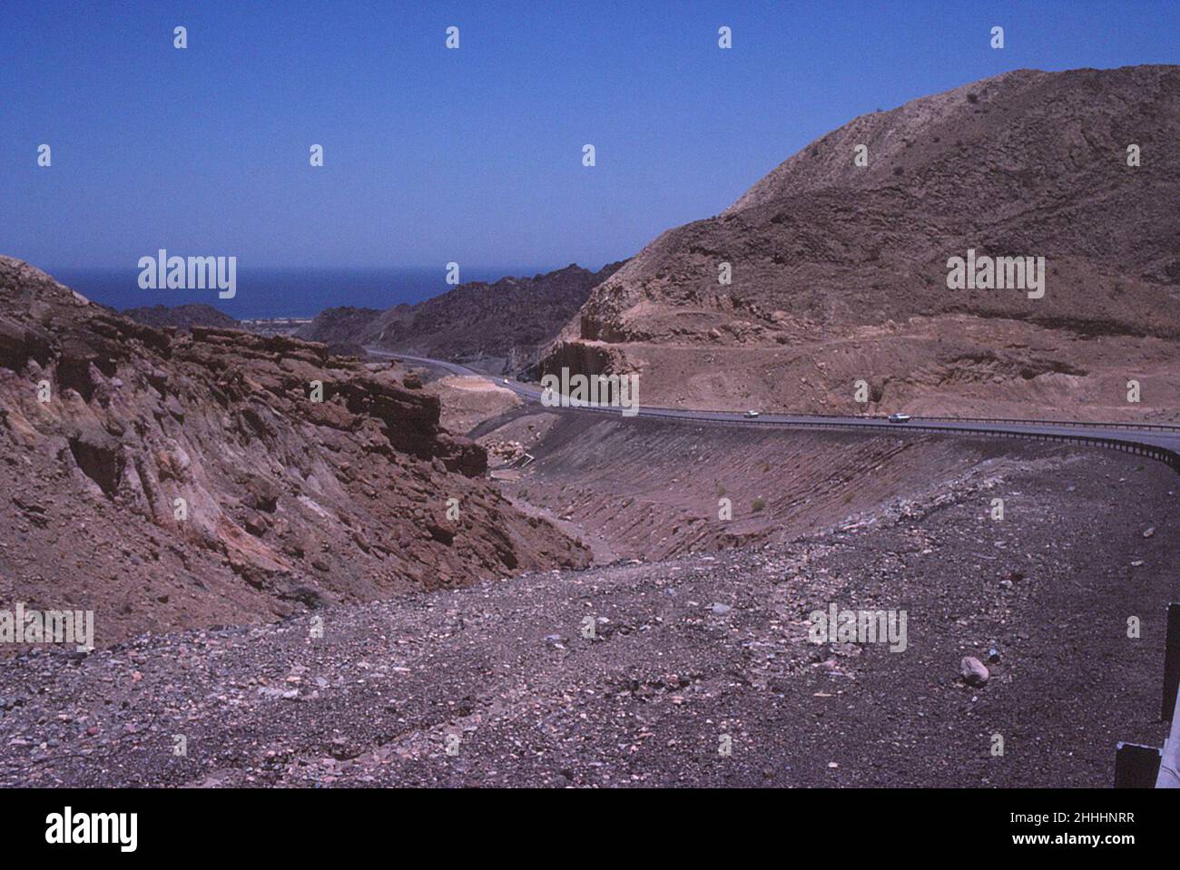 New highway through the mountains to the sea in Muscat, Oman, May 1978 Stock Photo