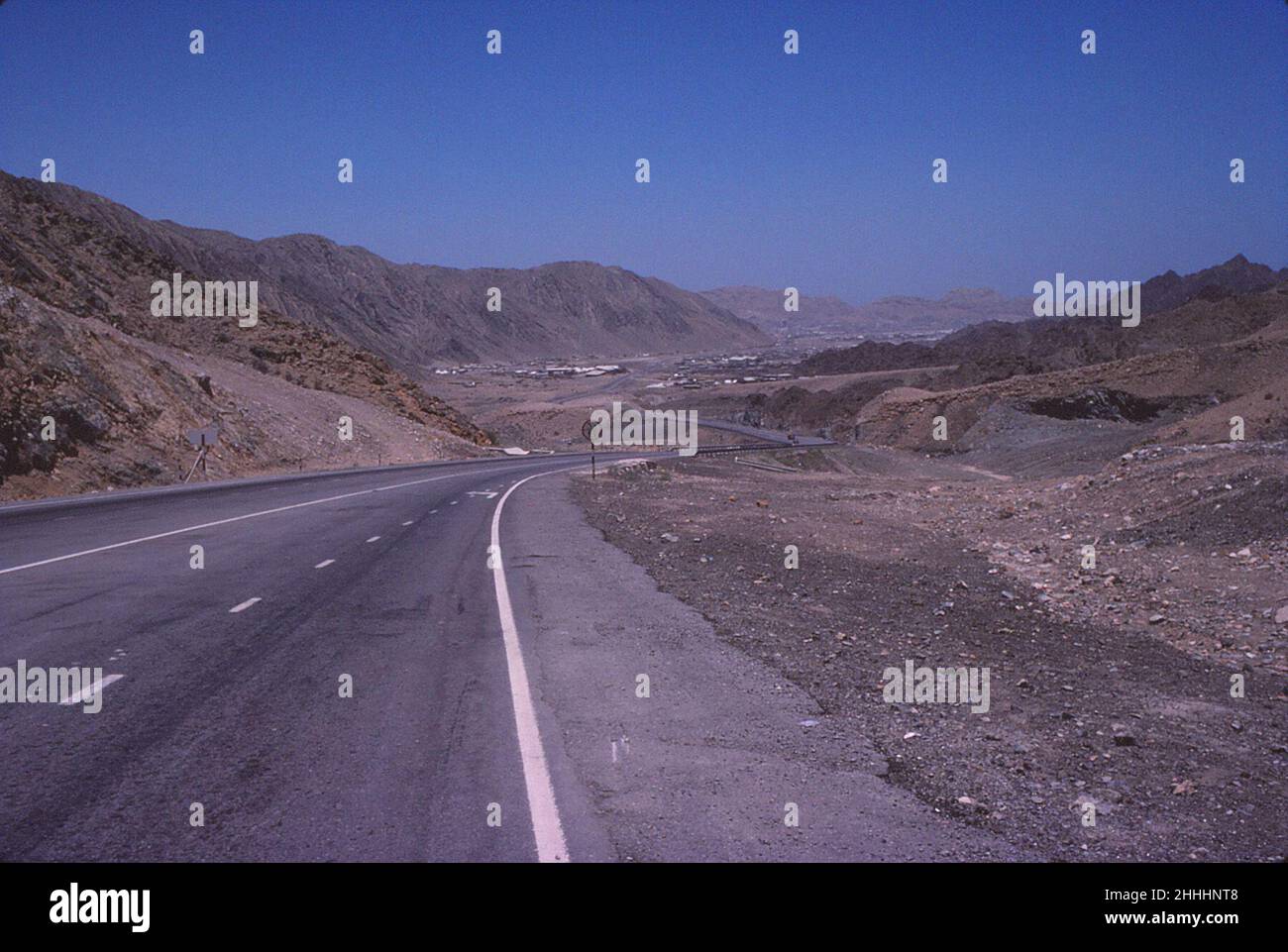 New highway through the mountains to the sea in Muscat, Oman, May 1978 Stock Photo