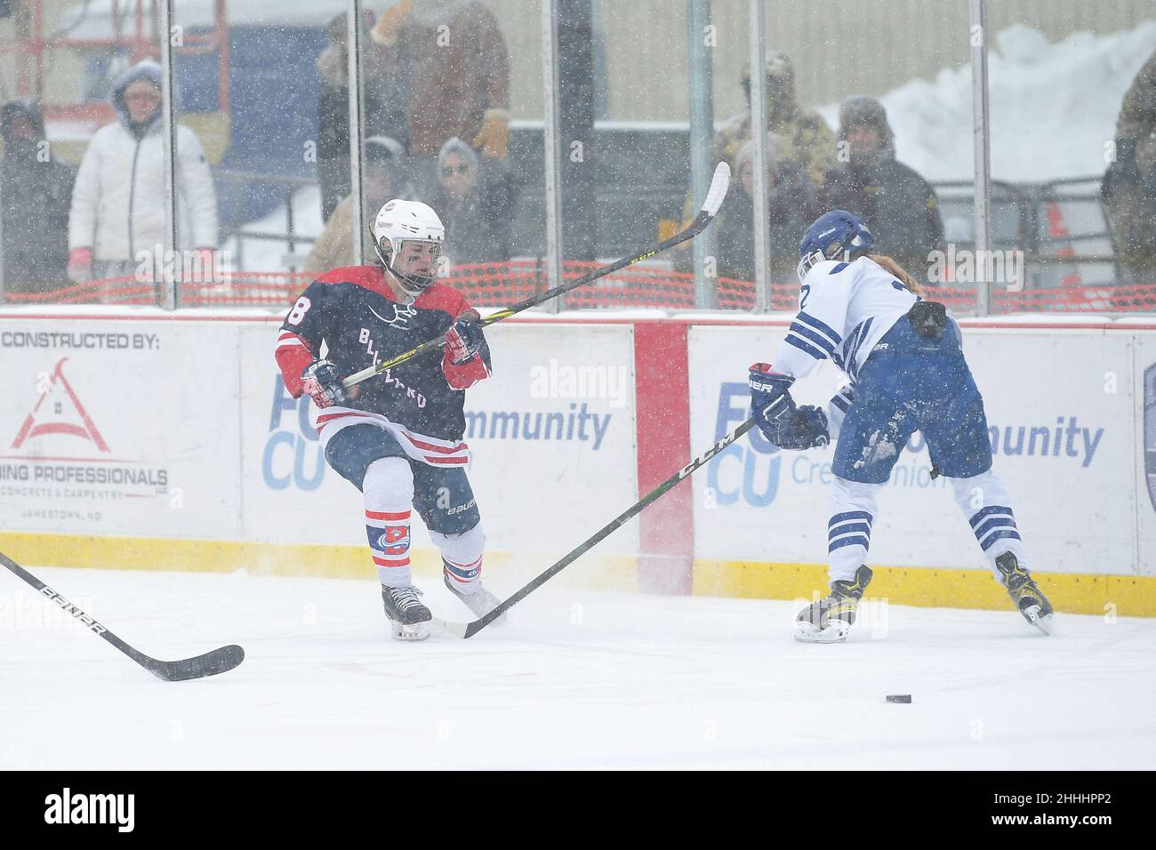 The Bismarck Blizzard and Jamestown Blue Jay girls hockey teams compete during the 3rd annual Hockey Day North Dakota outdoor hockey event in Jamestown, ND. Youth, high school and college hockey teams from around North Dakota competed over two days. By Russell Hons/CSM Stock Photo