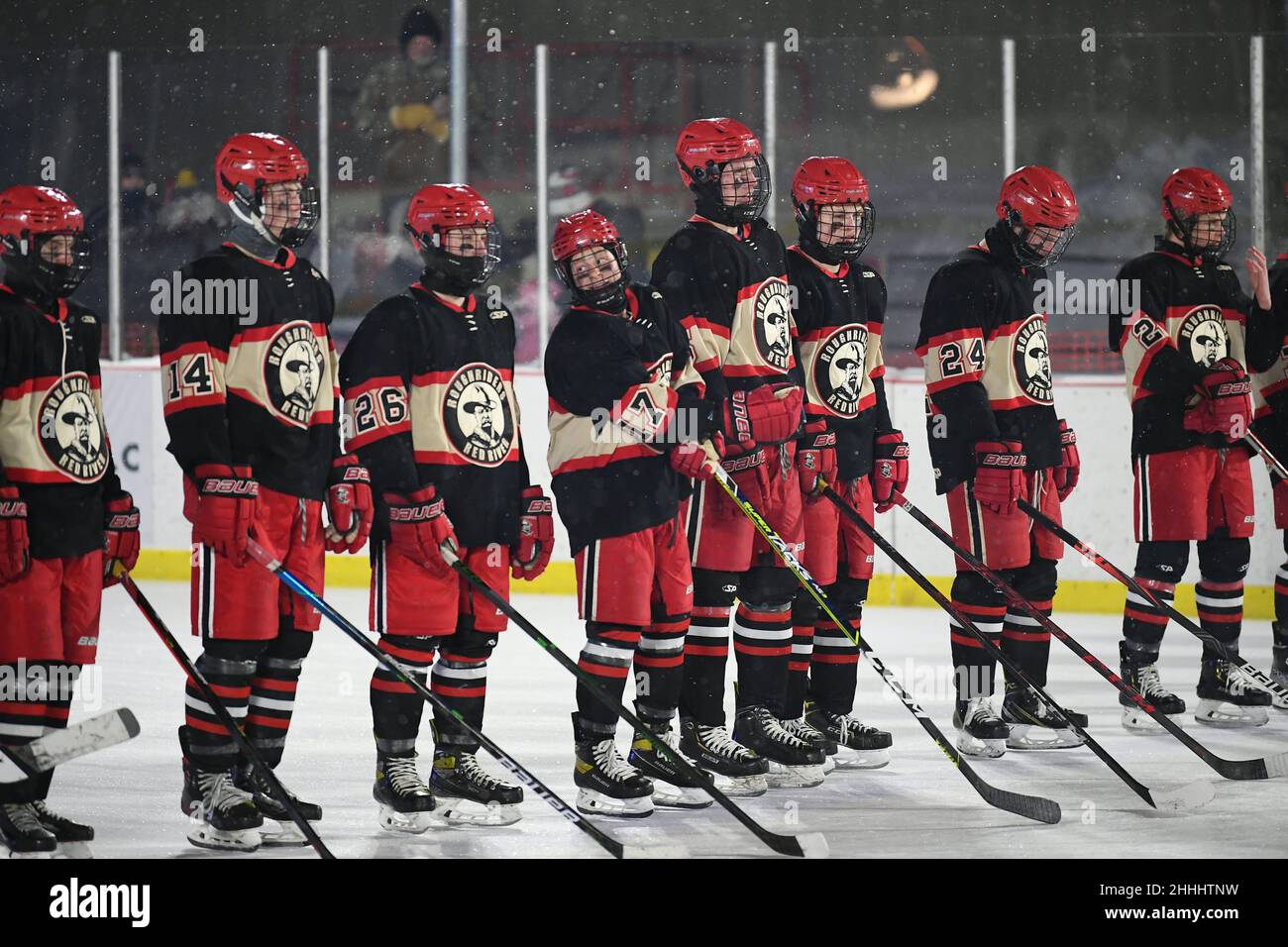 Grand Forks Red River Roughriders line up before their game against the Bismarck High Demons during the 3rd annual Hockey Day North Dakota outdoor hockey event in Jamestown, ND. Youth, high school and college hockey teams from around North Dakota competed over two days. By Russell Hons/CSM Stock Photo