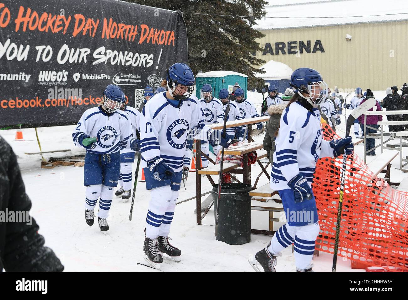 Jamestown Blue Jay girls hockey team players return to the ice during the 3rd annual Hockey Day North Dakota outdoor hockey event in Jamestown, ND. Youth, high school and college hockey teams from around North Dakota competed over two days. By Russell Hons/CSM Stock Photo