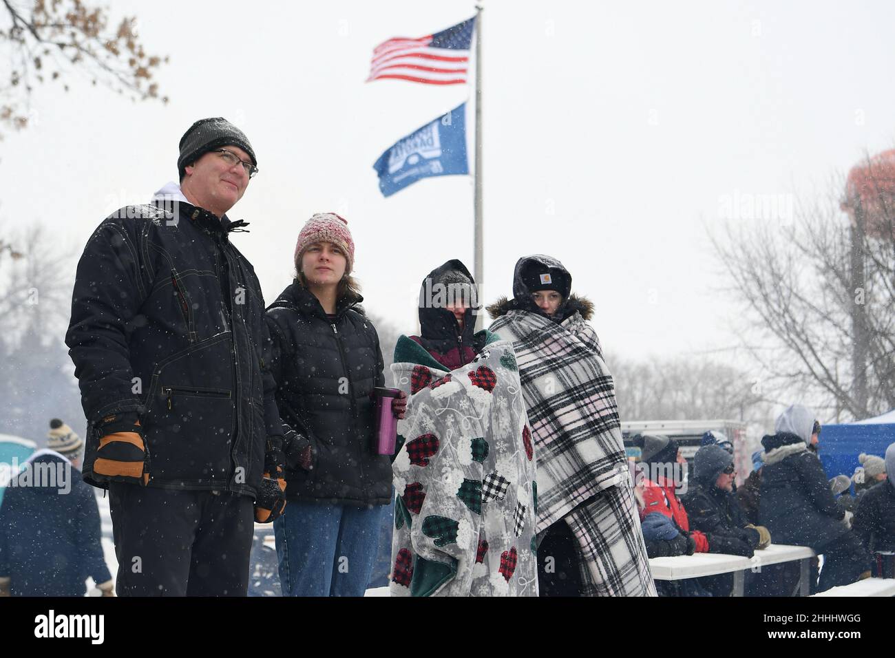 Fans watch the outdoor hockey game in subzero temperatures during the 3rd annual Hockey Day North Dakota outdoor hockey event in Jamestown, ND. Youth, high school and college hockey teams from around North Dakota competed over two days. By Russell Hons/CSM Stock Photo