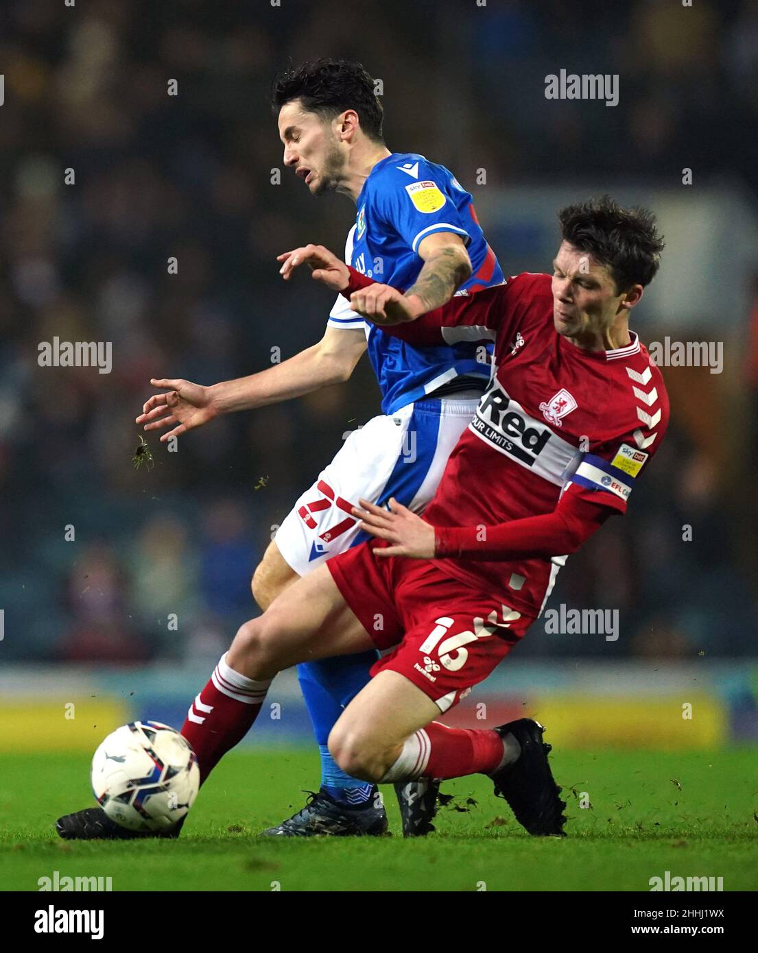Blackburn Rovers' Lewis Travis and Middlesbrough's Jonny Howson (right) battle for the ball during the Sky Bet Championship match at Ewood Park, Blackburn. Picture date: Monday January 24, 2022. Stock Photo