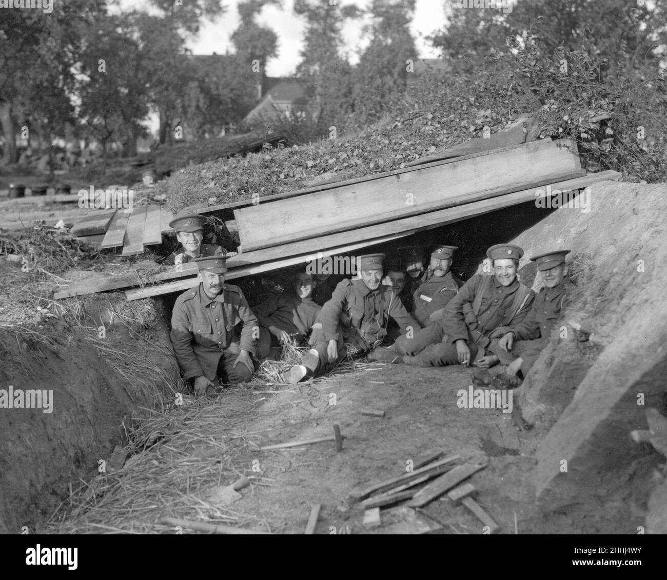 British Royal Marines seen here enjoying a rest and a smoke in their bomb-proof shelter at Vieux Wien near Antwerp. Circa October 1st1914. *** Local Caption *** Published Daily Mirror Page 9 October 12th 1914Published Daily Mirror Page 9 October 12th 1914 Stock Photo