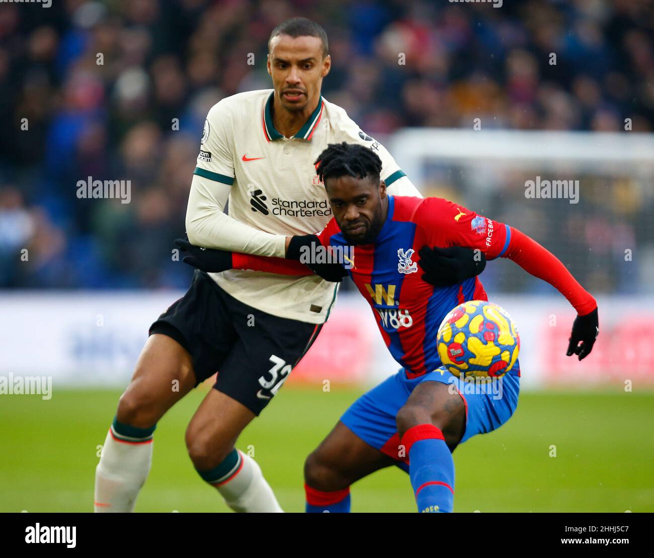 LONDON, United Kingdom, JANUARY 23:L-R Liverpool's Joel Matip and Crystal Palace's Jeffrey Schlupp during Premier League between Crystal Palace and Li Stock Photo