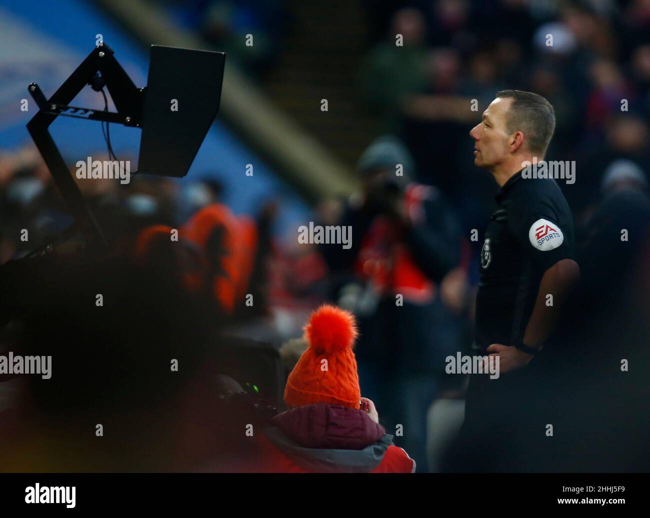 LONDON, United Kingdom, JANUARY 23: Referee Kevin Friend looking at VAR to confirm a penalty during Premier League between Crystal Palace and Liverpoo Stock Photo