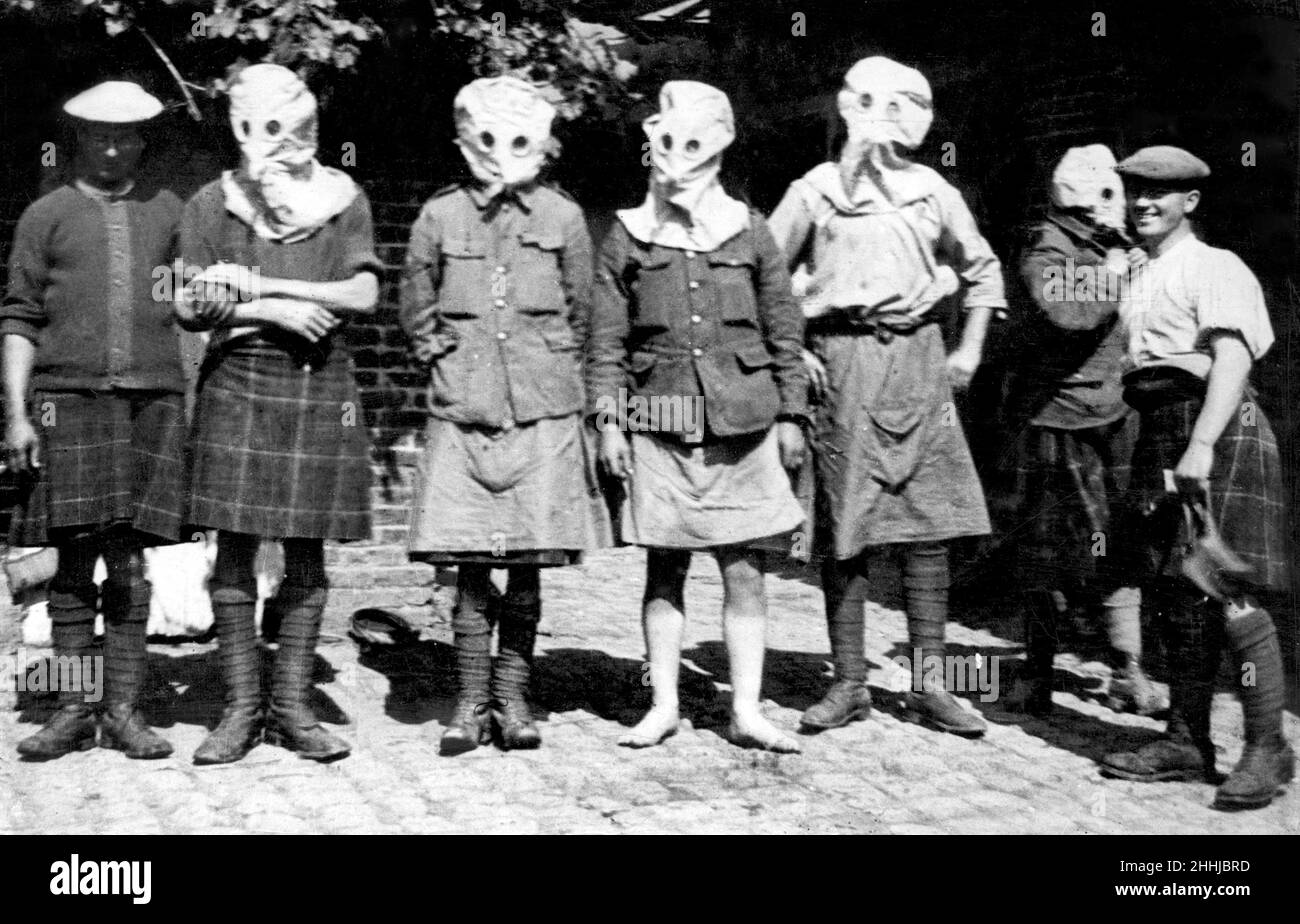 Just behind the British frontline. Men of the Scottish regiment get use to wearing their respirators. 28th October 1915 Stock Photo