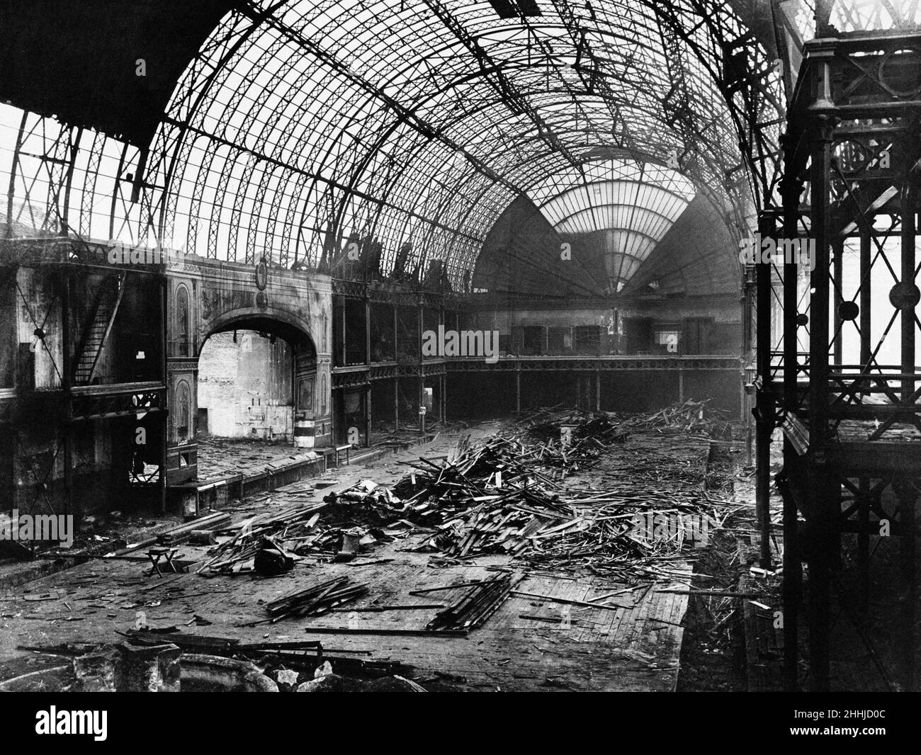 Demolition of The Royal Aquarium and Winter Garden in Westminster. The building opened 1876 it was located immediately to the west of Westminster Abbey on Tothill Street. Designed by Alfred Bedborough in a highly ornamental style faced with Portland stone. At the west end of the building was the Aquarium Theatre renamed in 1879 The Imperial Theatre. The building was demolished in 1903. Westminster Central Hall is now located on the site. Circa 1903 Stock Photo