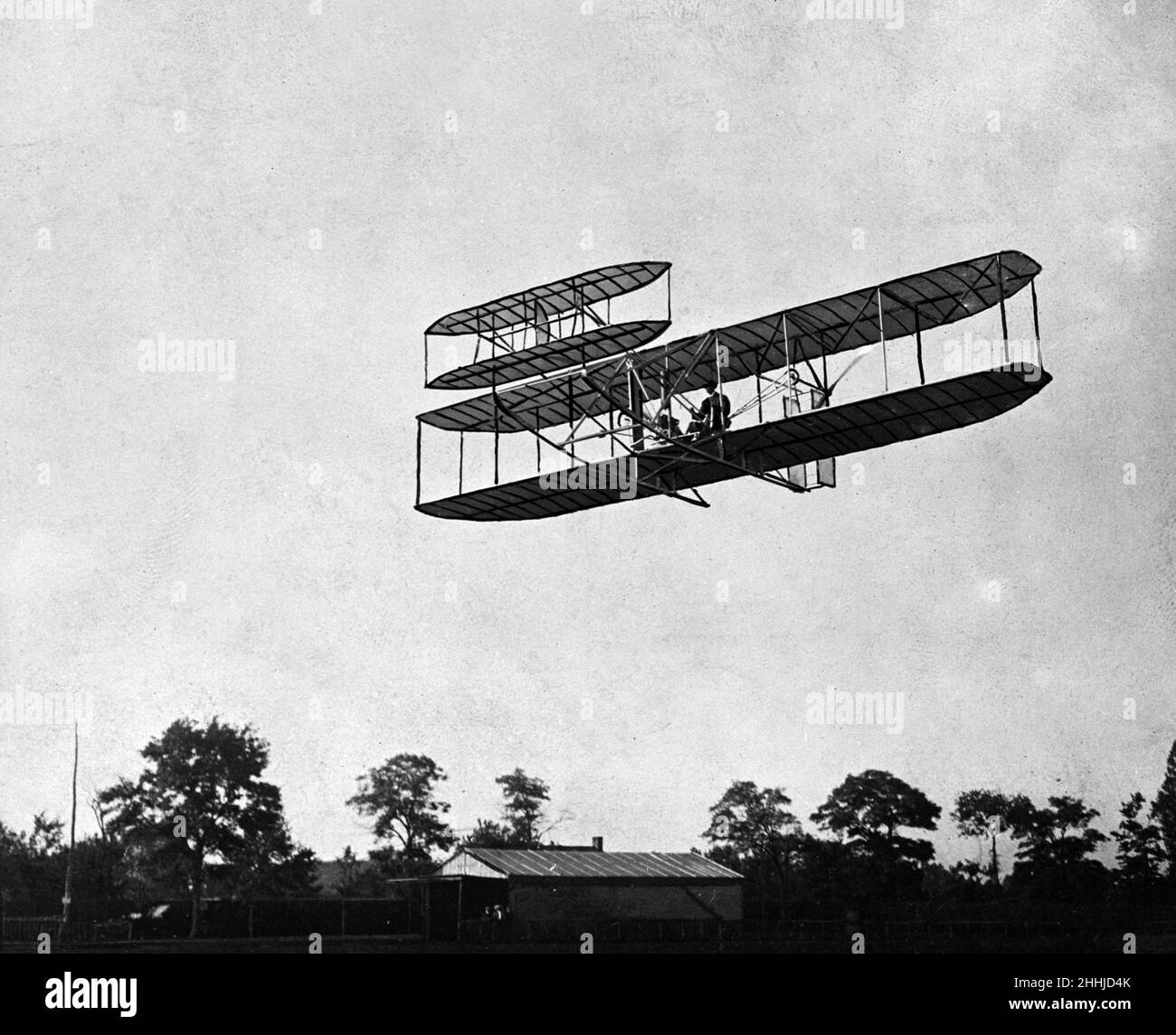 The Wright Brothers plane being flown in Pau, France, 1909. Their original machine of 1903 in which they first flew was damaged by high winds in Ohio and never used again. Stock Photo