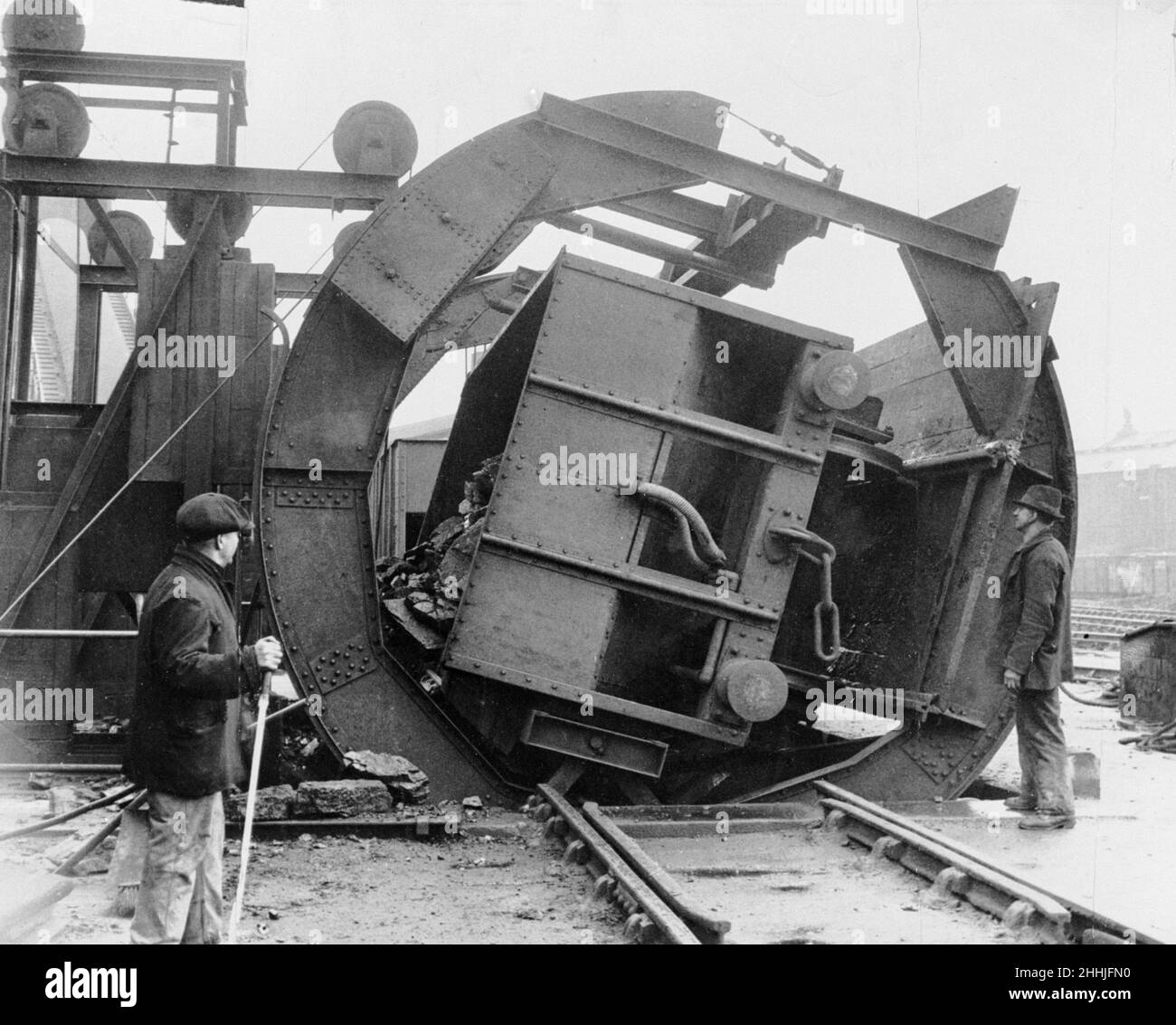 A 20 ton truck of coal being completely turned over. December 1924