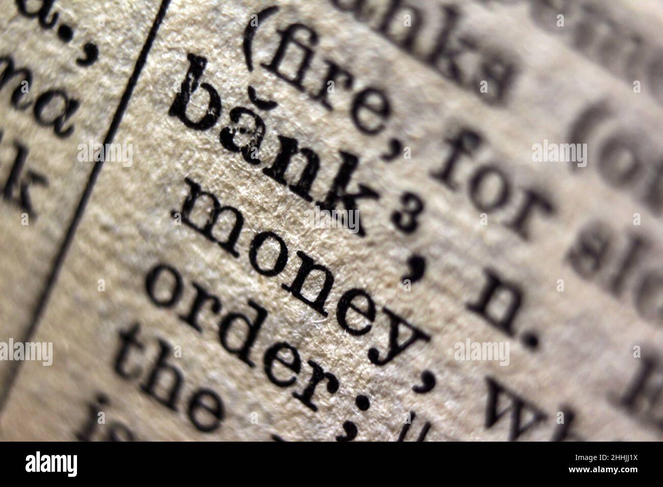Word 'bank' printed on dictionary page, macro close-up Stock Photo