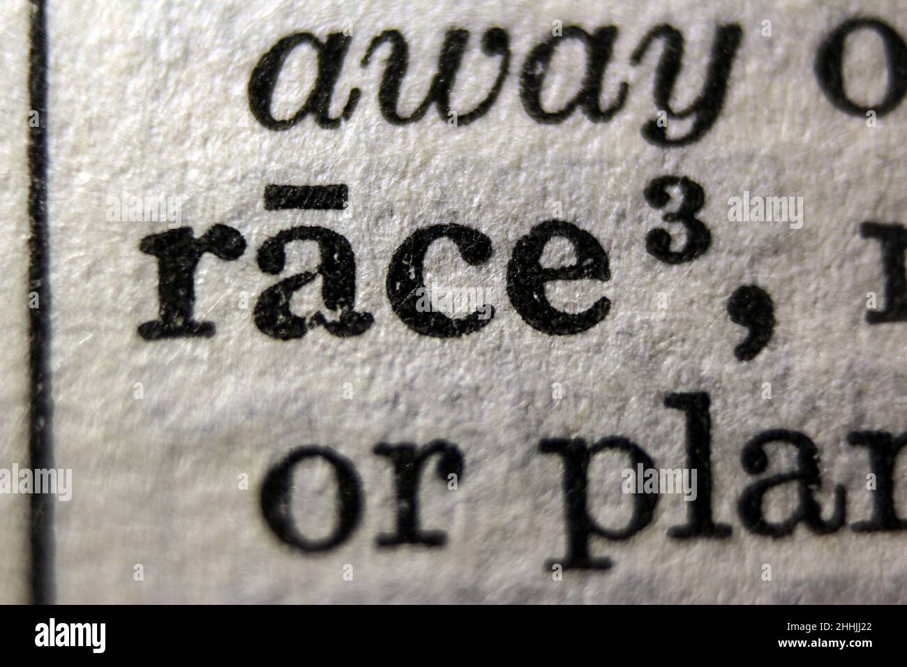 Definition of word race on dictionary page, closeup Stock Photo Alamy