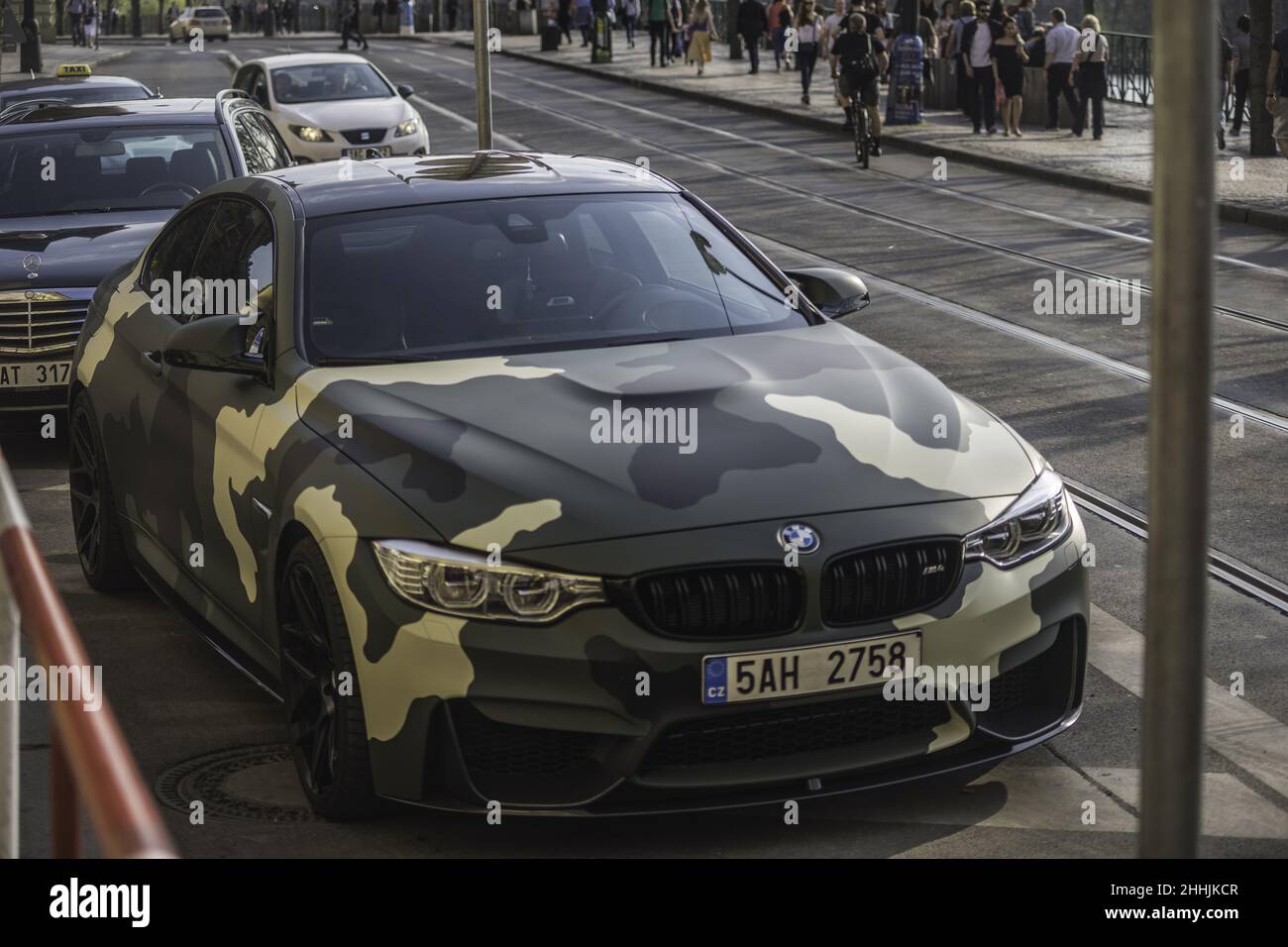 Stunning camouflage painted BMW F82 car in the street in Praga, Czech  Republic Stock Photo - Alamy