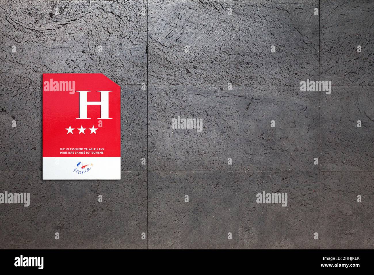 Paris, France - January 2022: Outdoor sign displaying the number of star of an hotel (valid 5 years). This classification, which concerned only campin Stock Photo