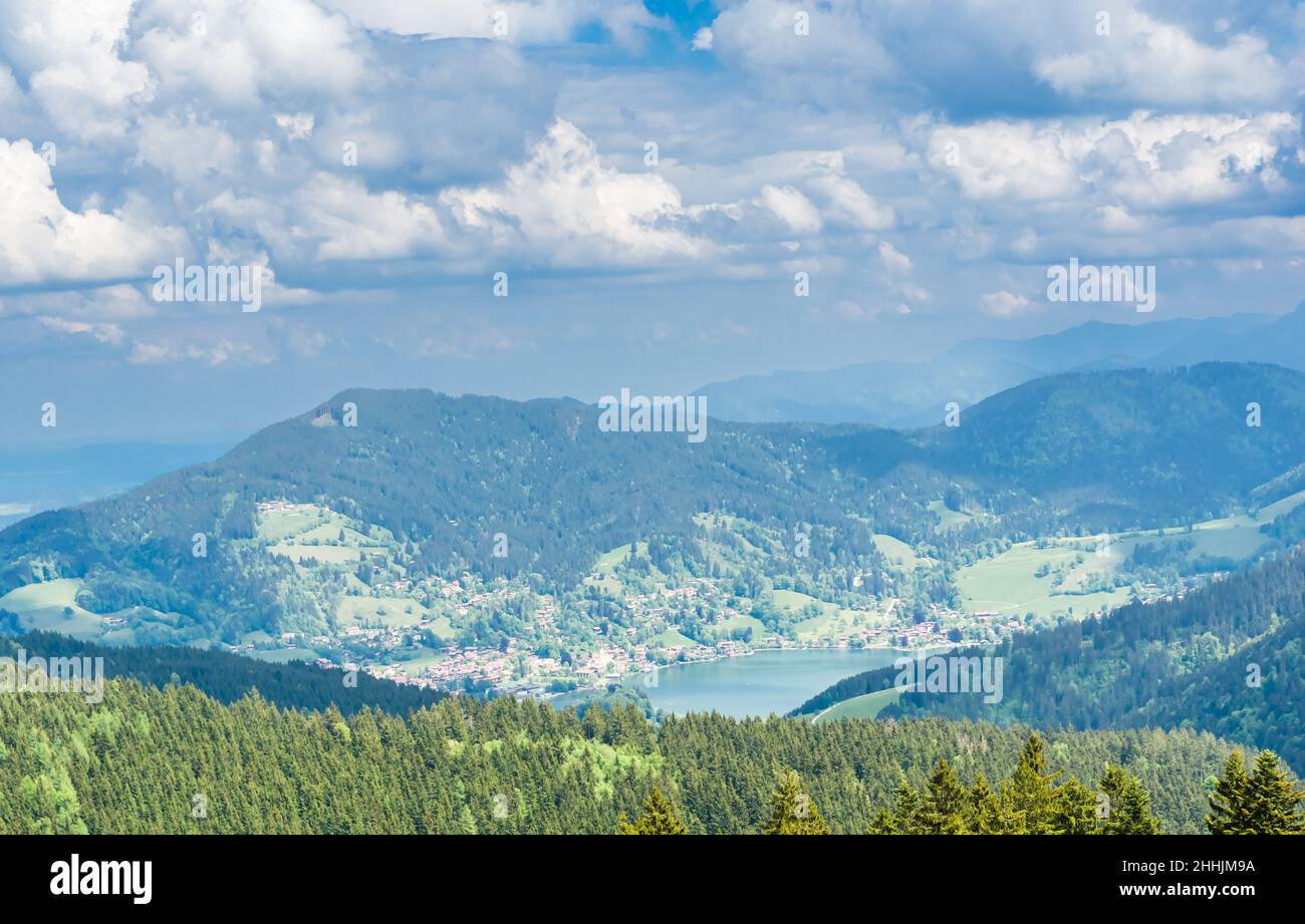 view to lake schliersee and health resort, from durnbach mountain. beautiful bavarian landscape. blue sky light clouds. Stock Photo