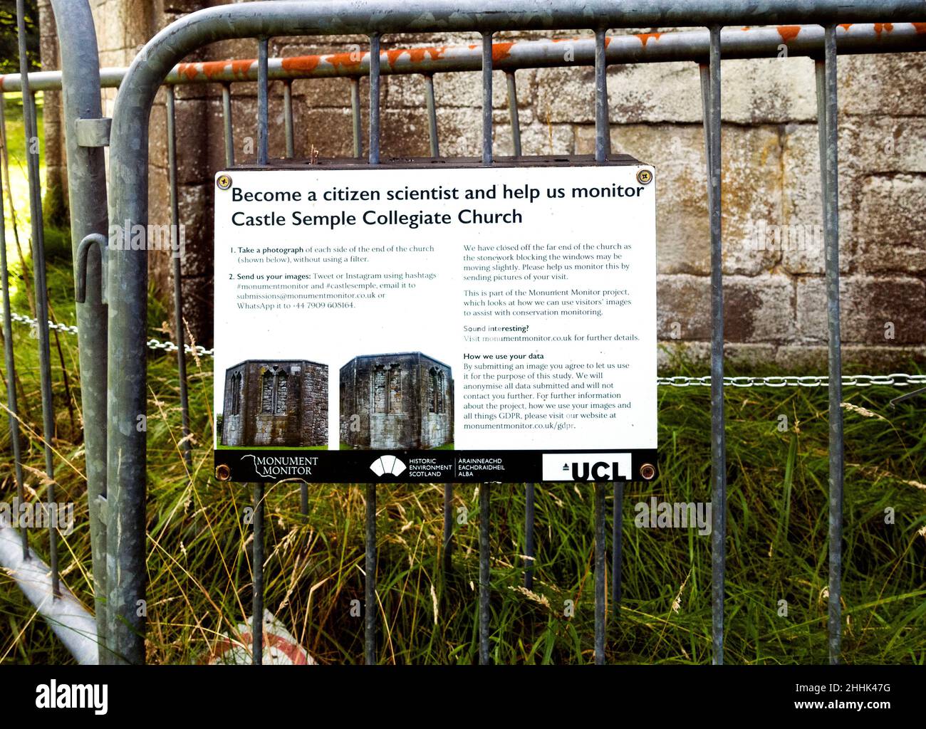 Monument Monitor sign affixed to a barrier outside Castle Semple Collegiate Church, requesting visitors to photograph both ends of the building. Stock Photo