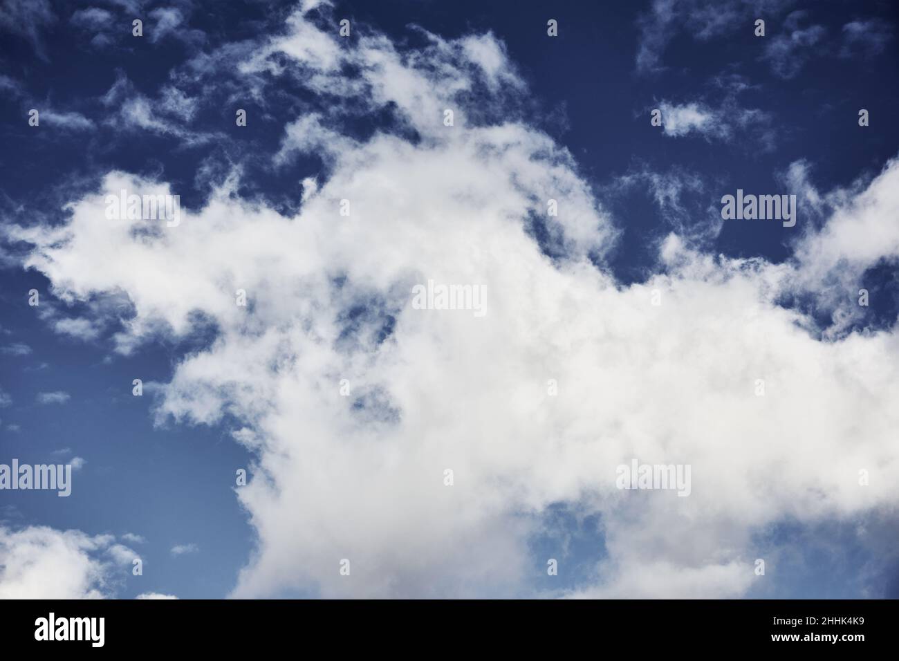 White clouds against blue sky Stock Photo - Alamy