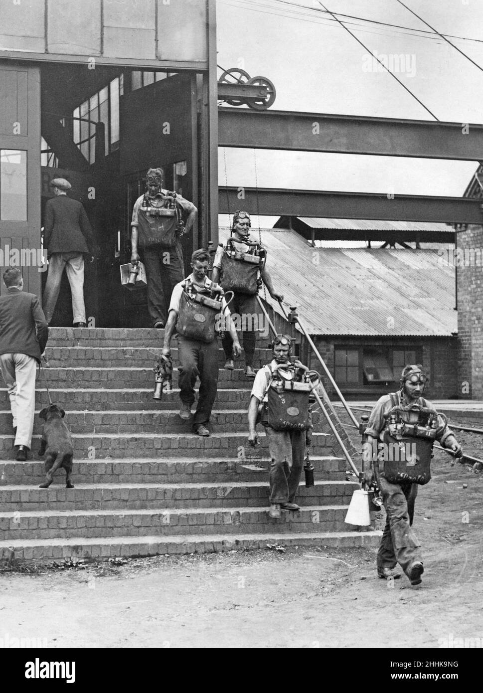 Gresford Colliery Disaster 22nd September 1934One of the rescue teams of miners leave the pit-head for a well earned rest after being underground at Gresford Colliery, near Wrexham following an underground explosion that killed 266 men and boys. Stock Photo