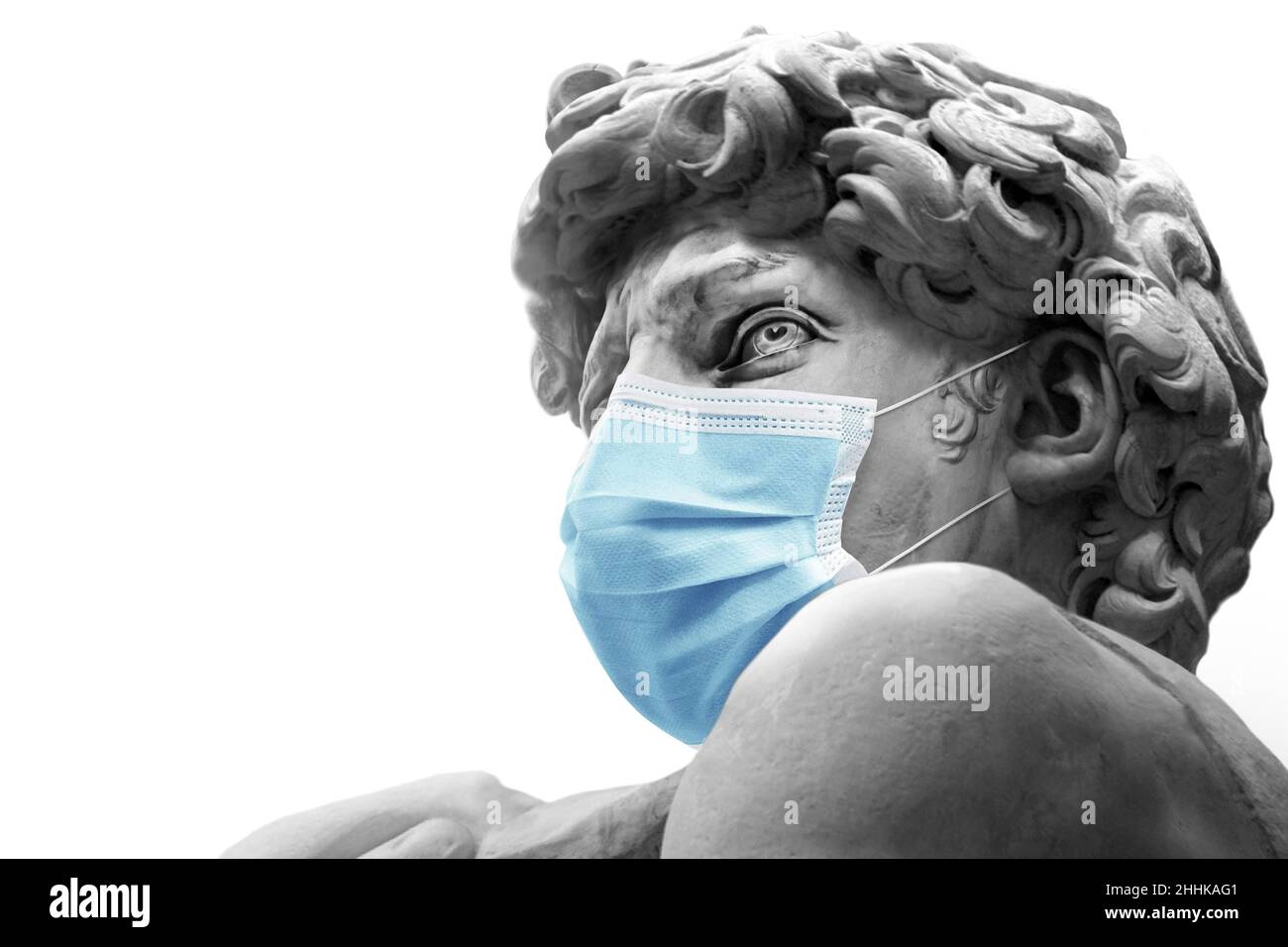 David by Michelangelo With a medical mask isolated , Renaissance sculpture created in marble Stock Photo