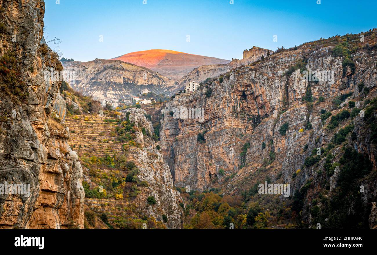 Majestic sunset in the mountains landscape. Wadi Kadicha Bchareh, Lebanon. Stock Photo