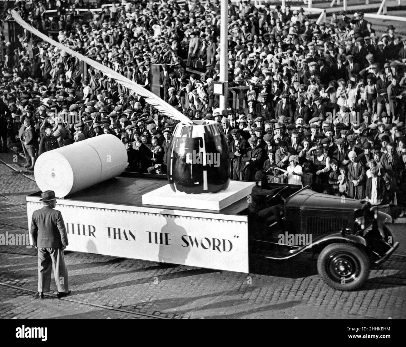 Press car in procession at the Tunnel Pageant round the Old Haymarket, Liverpool. 16th July 1934. Stock Photo