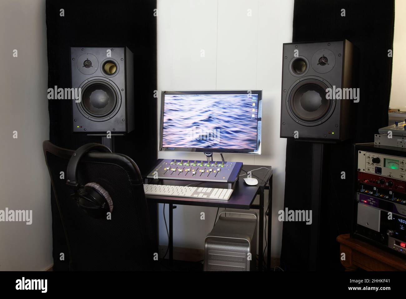 Mixing console and speakers in recording studio Stock Photo