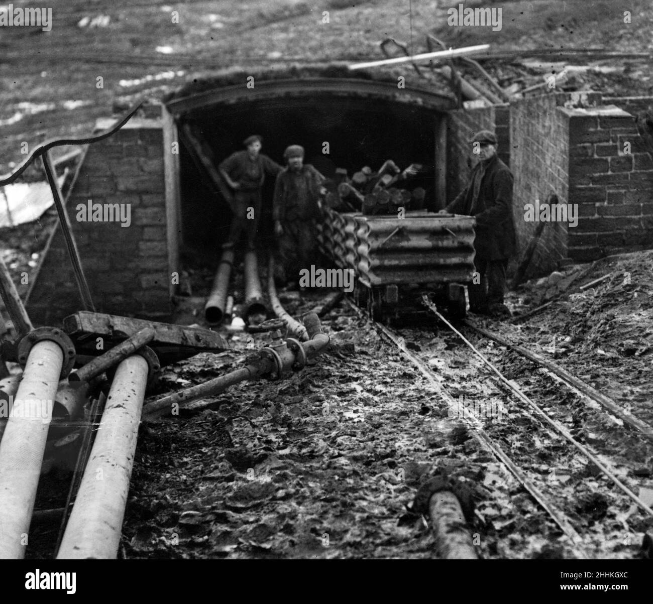 The entrance to the main drift at the Belsay Colliery, Northumberland, it is now three-quarters of a mile in length, and has 250 feet of cover. That is the depth of the surface to the coal. 24th January 1928. Stock Photo