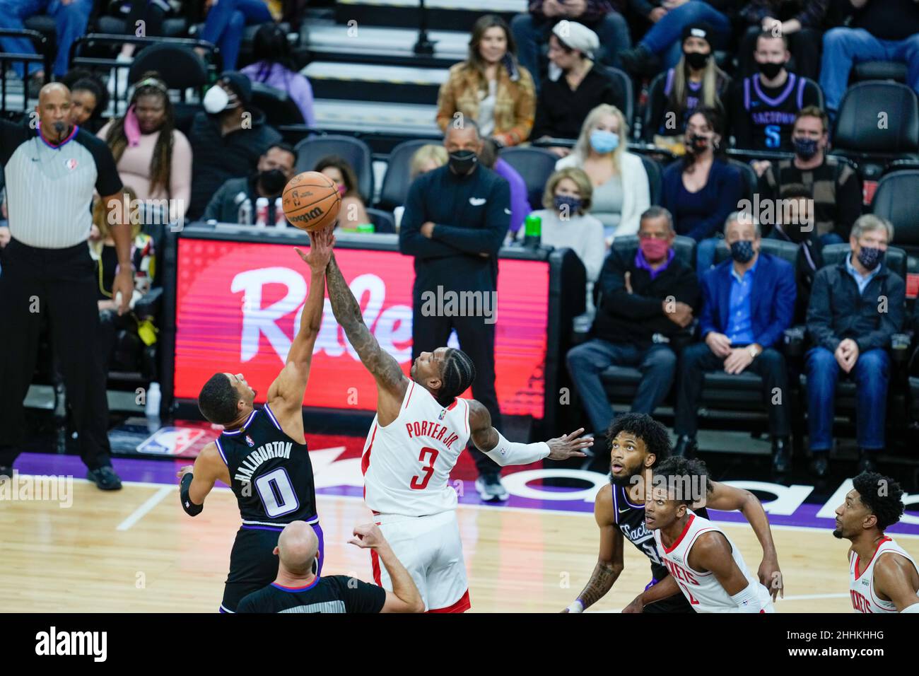 Houston Rockets guard Kevin Porter Jr (3) and Sacramento Kings guard Tyrese Haliburton (0) tip off for possession at the NBA game between the Houston Stock Photo