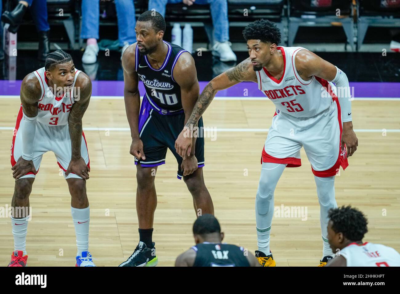 Sacramento Kings forward Harrison Barnes (40) stands between Houston Rockets players Kevin Porter Jr (3) and Christian Wood (35) at the NBA game betwe Stock Photo