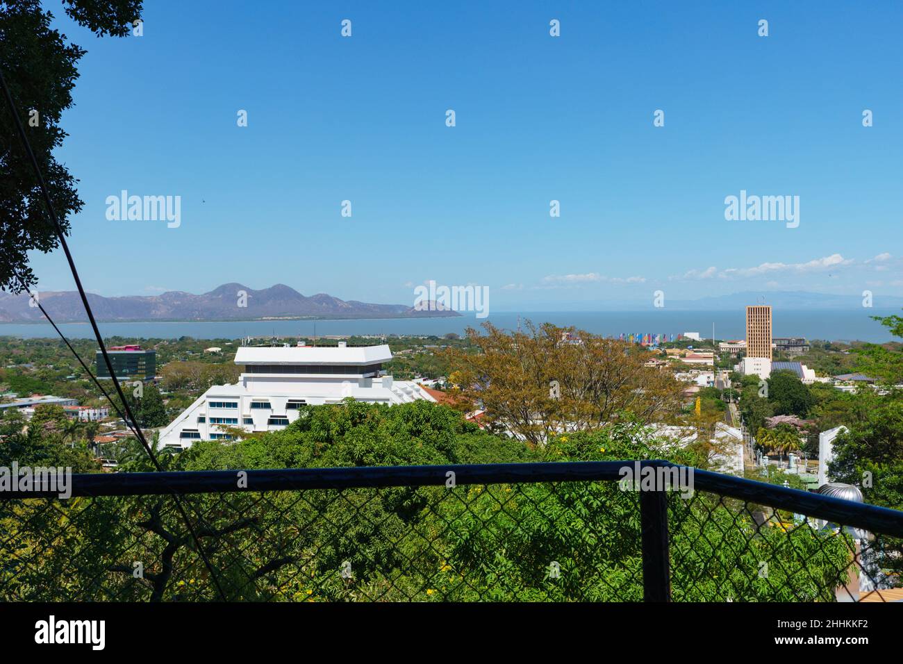 Managua skyline with the Crowne Plaza Hotel in the foreground and Lake Xolotlan and hills in the background. Stock Photo