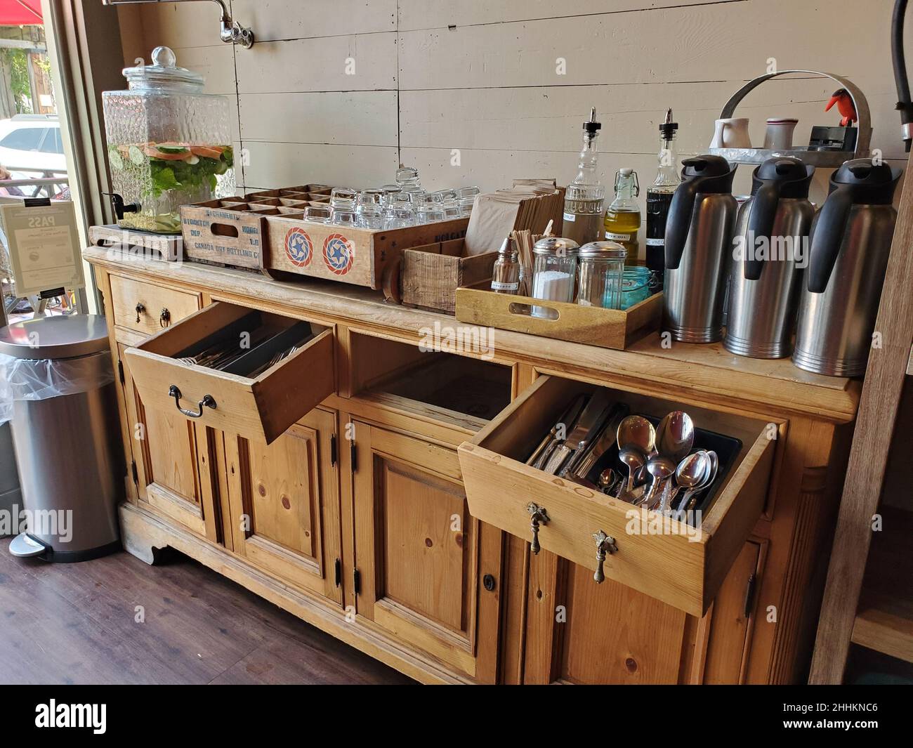 Antique sideboard with utensils and condiments at Sideboard Restaurant