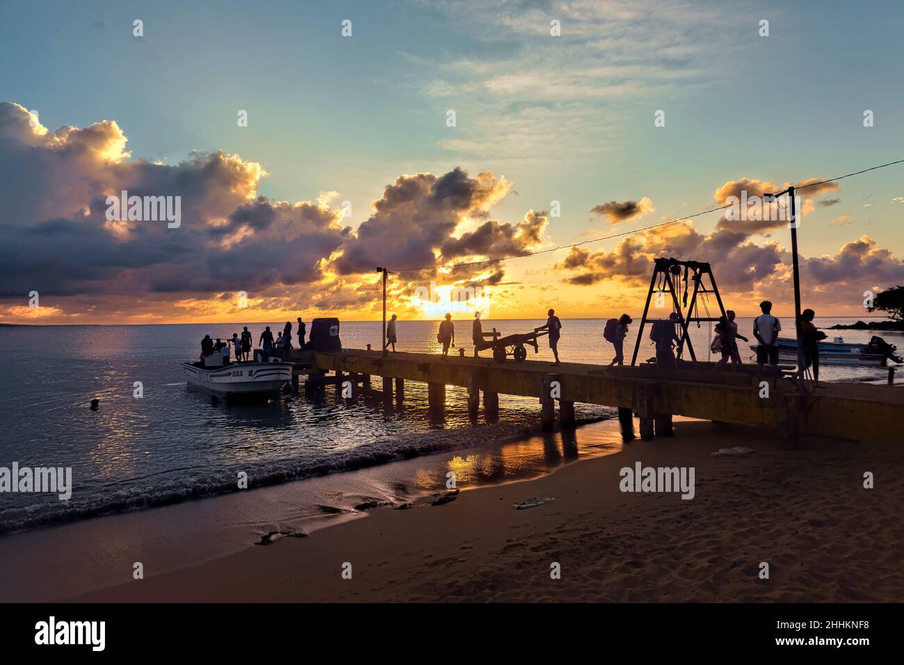 Panga ferry arrival at sunset, Little Corn Island, Nicaragua Stock