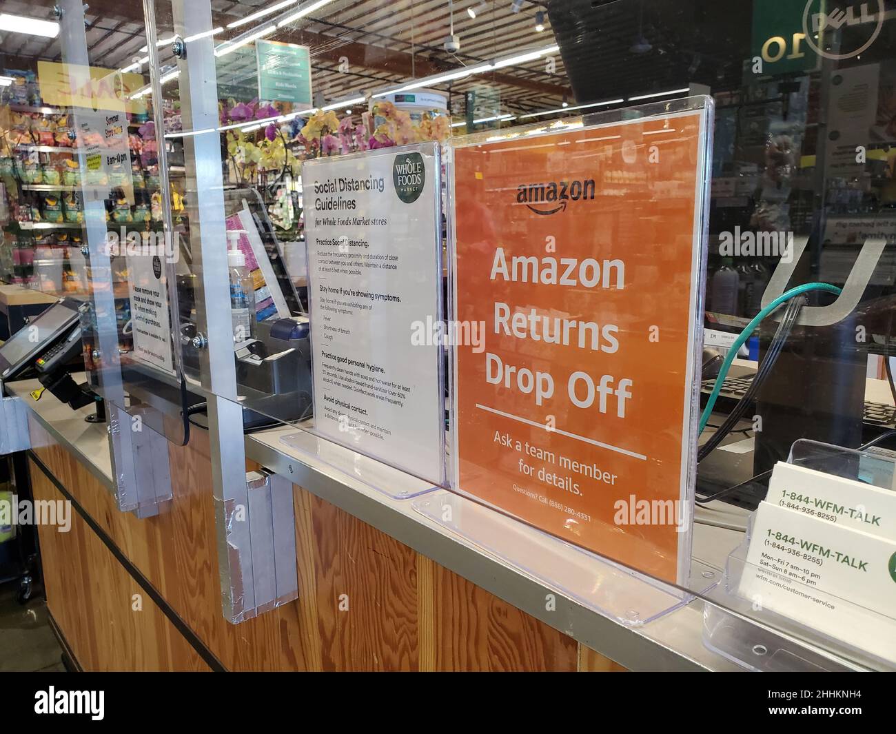 Sign for Amazon returns at the customer service desk of a Whole Foods