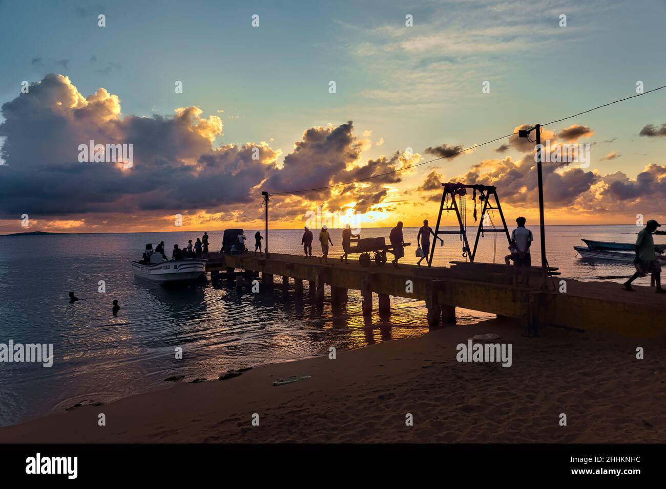 Panga ferry arrival at sunset, Little Corn Island, Nicaragua Stock