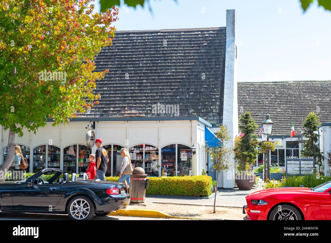 Cars are visible in front of Carmel Plaza shopping area in downtown Carmel, California, September 5, 2021. Photo courtesy Sftm. Stock Photo