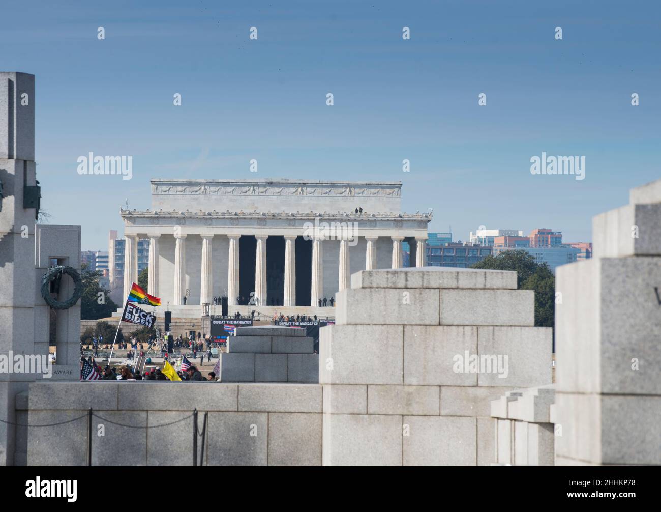 Demonstrators participate in the Defeat the Mandates march towards the Lincoln Memorial reflective pool in Washington, DC, on January 23, 2022. Stock Photo