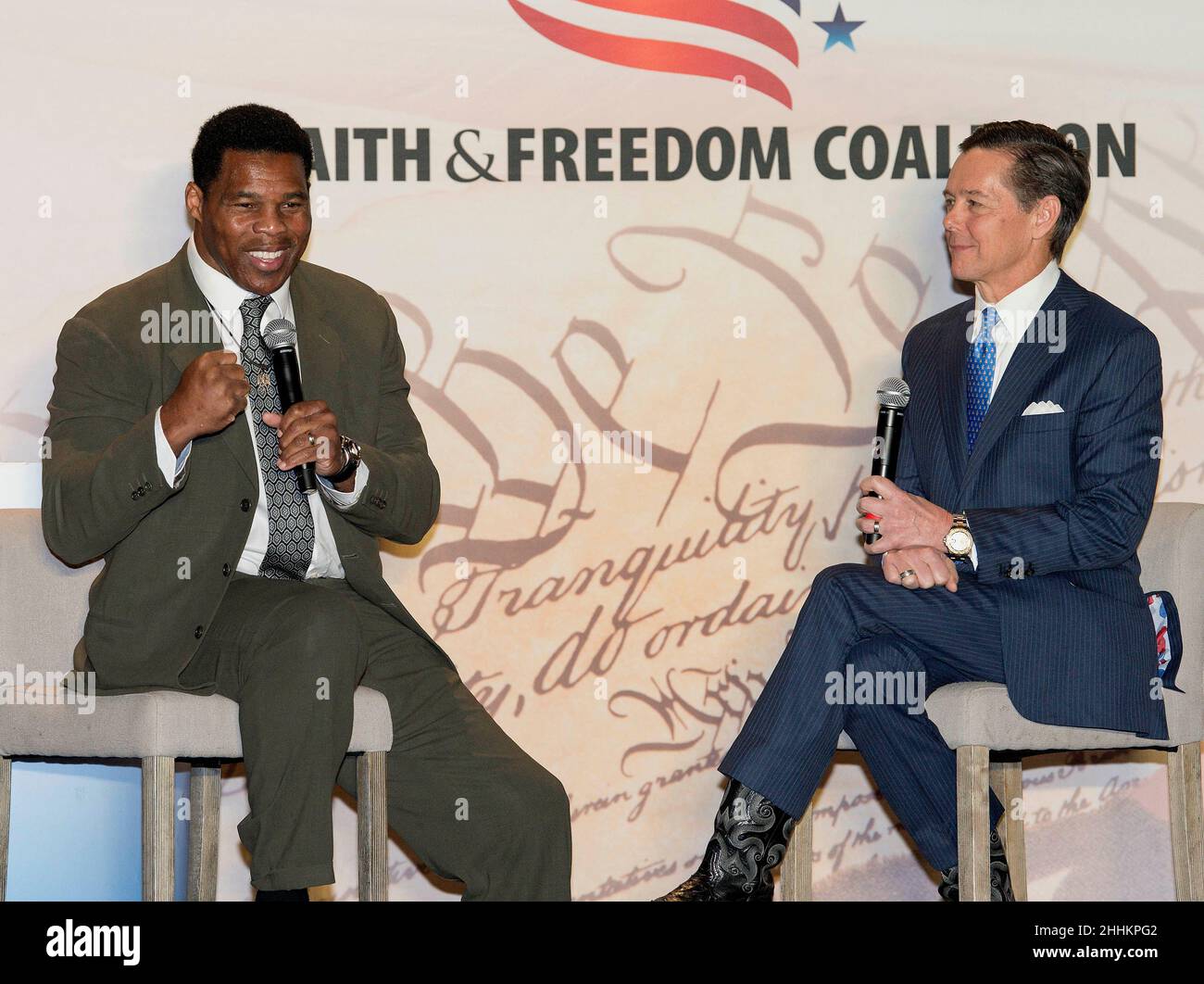 Atlanta, Georgia, USA. 24th Jan, 2022. HERSCHEL WALKER, the Trump-endorsed candidate for U.S. Senator from Georgia, shares the stage with RALPH REED at the Georgia Faith & Freedom Luncheon.(Credit Image: © Brian Cahn/ZUMA Press Wire) Stock Photo