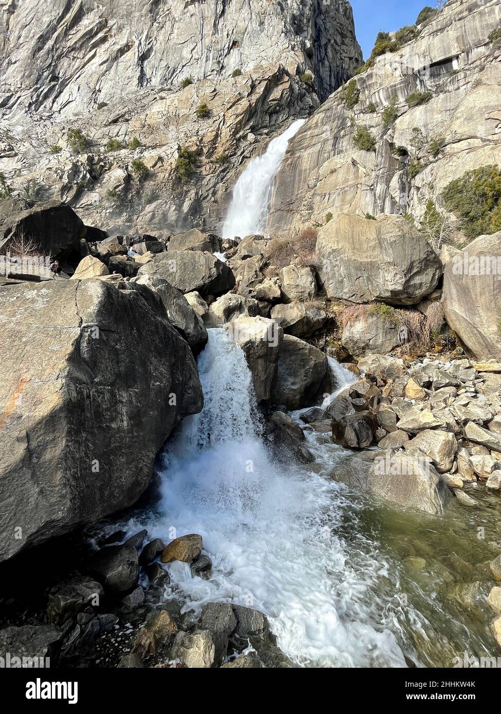 Yosemite National Park, CA, U.S.A. 24th Jan, 2022. The Wapama Falls works its way down to the Hetch Hetchy Reservoir. The Hetch Hetchy Reservoir has a picture perfect hike around the north side of the reservoir. (Credit Image: © Marty Bicek/ZUMA Press Wire) Stock Photo